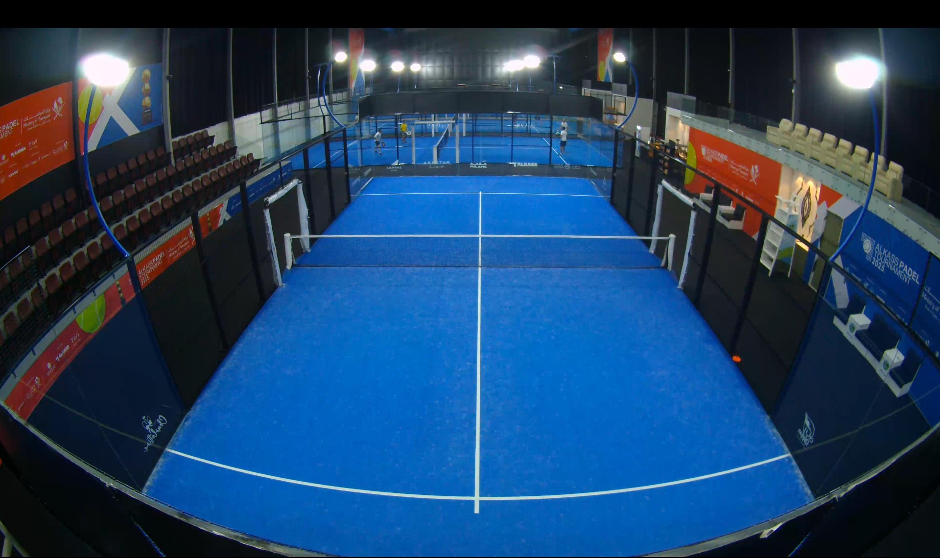 GAMETRAQ 6 camera view of a padel tournament court with sponsor boards and seating